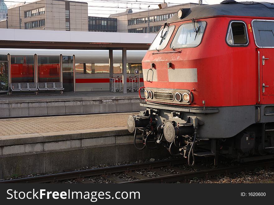 Red european locomotive, taken at central station Munich, Germany. Copy-space. Red european locomotive, taken at central station Munich, Germany. Copy-space.