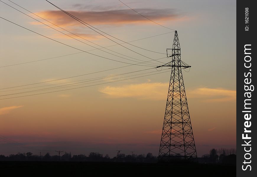 Pillar of high voltage about sunset, silhouette. Pillar of high voltage about sunset, silhouette