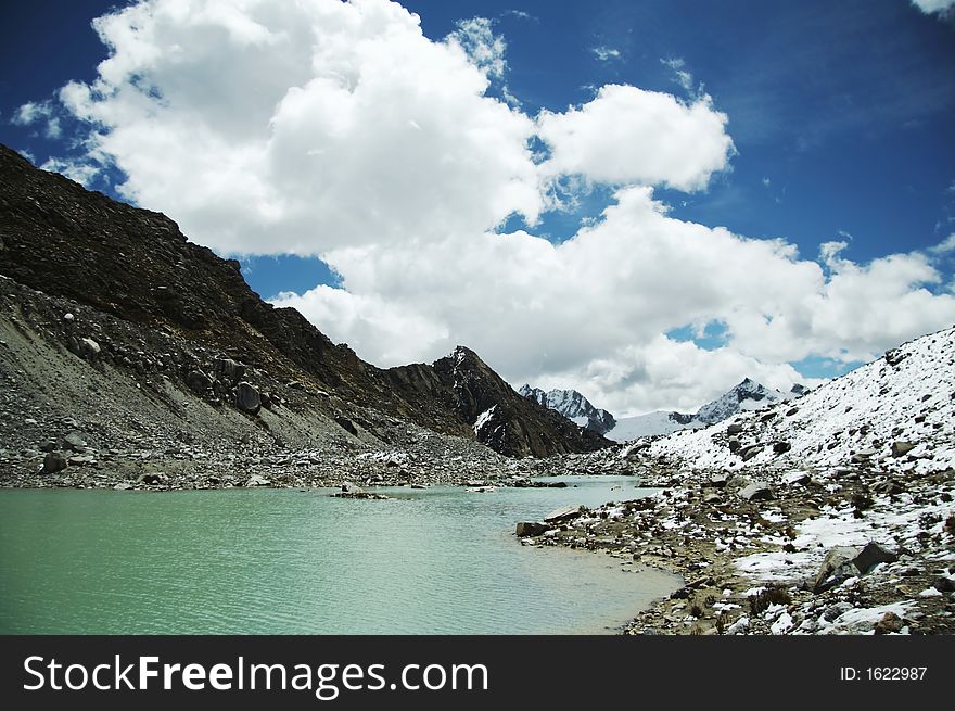 Mountain Lake And Clouds