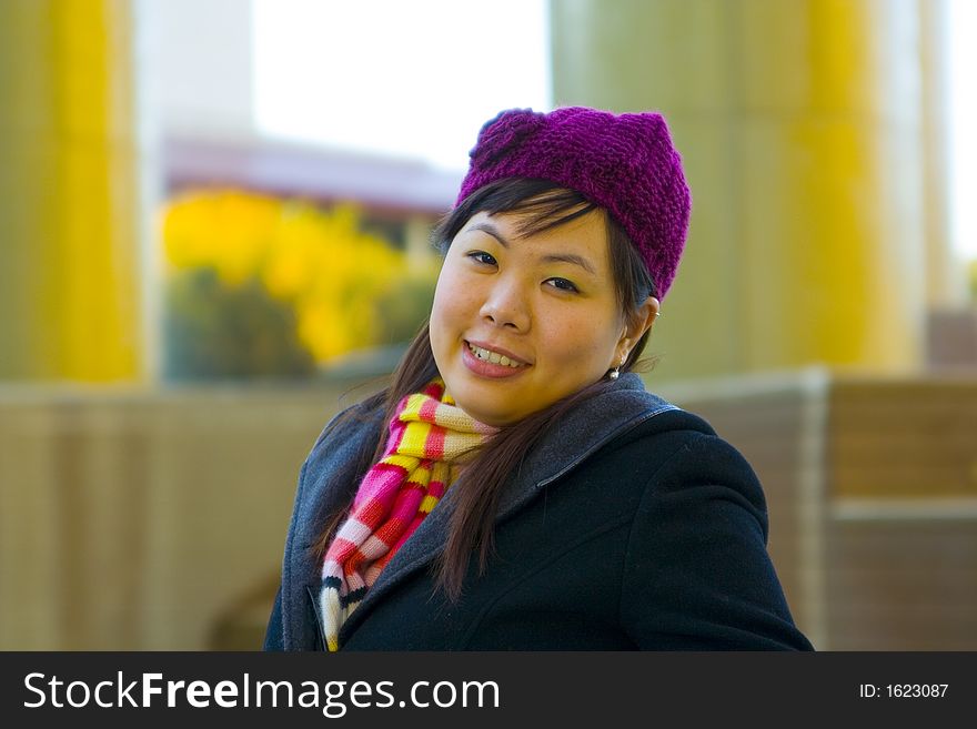 Happy young asian girl in winter clothes. Happy young asian girl in winter clothes