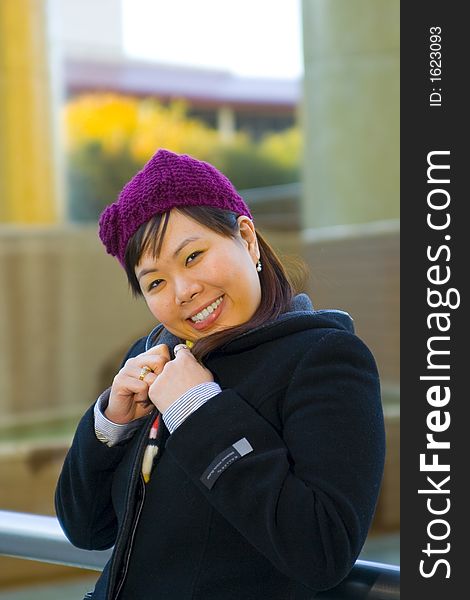 Happy young asian girl in winter clothes. Happy young asian girl in winter clothes