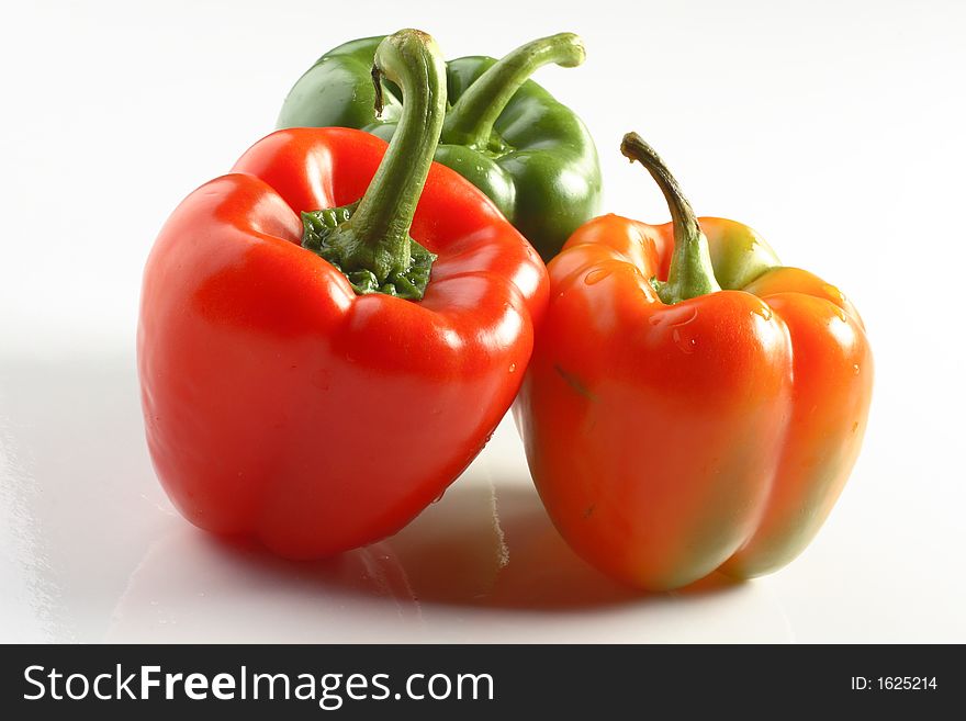 Red green orange bell-pepper vegetable healthy isolated. Red green orange bell-pepper vegetable healthy isolated