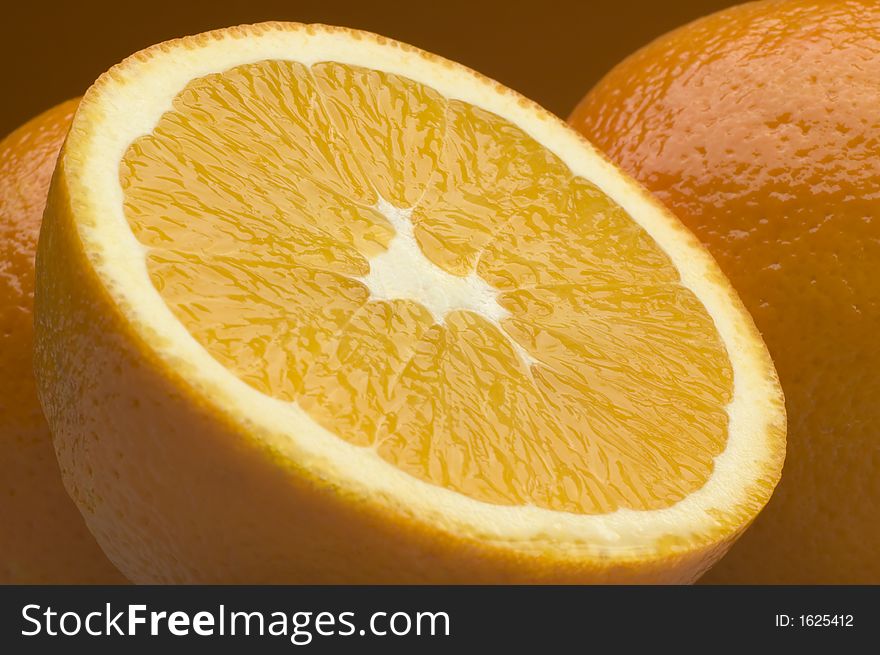 Fesh orange sliced fruit close up shoot