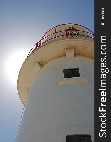 Lighthouse at Corny Point with interesting lighting effects. Taken at midday on a hot summers day with the sun high in the sky. interesting bird nest. Lighthouse at Corny Point with interesting lighting effects. Taken at midday on a hot summers day with the sun high in the sky. interesting bird nest