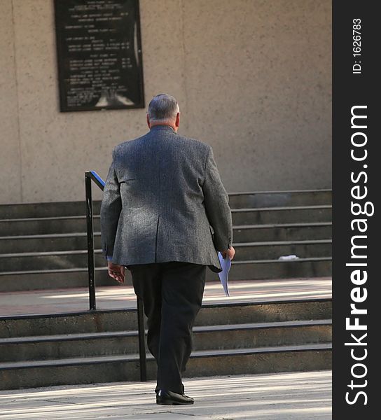 Attorney walking up to the courthouse. Attorney walking up to the courthouse