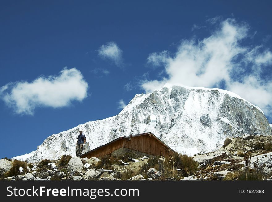 Climber,hut and Ranrapalka peak in Cordilleras. Climber,hut and Ranrapalka peak in Cordilleras