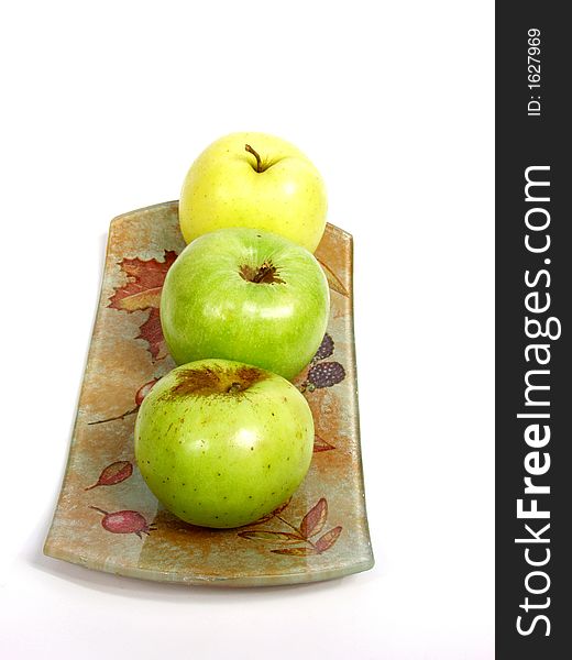 Decorated tray with green and yellow apples