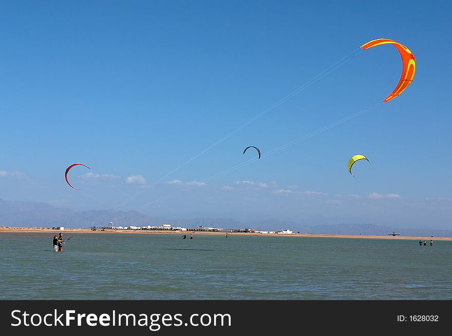 Kites boards kiteboards sea surfers surf water