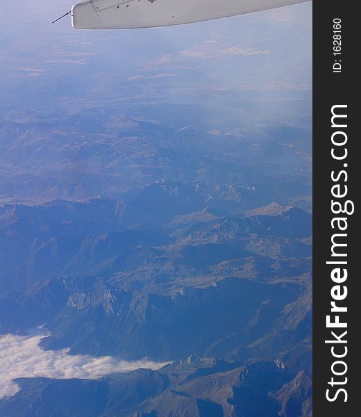 Sight of french/spanish mountains (the Pyrenees) from a flying plane