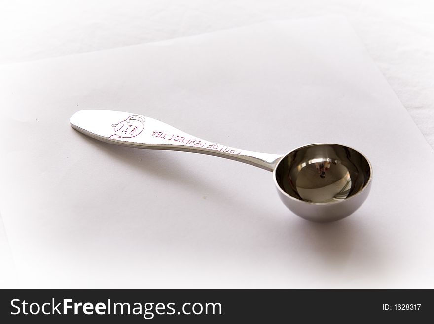 Tea Measures Spoon 1 cup of perfect tea on white