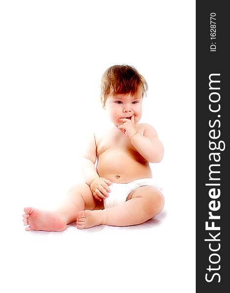 Beautiful baby. Shot in studio. Isolated on white. Beautiful baby. Shot in studio. Isolated on white.