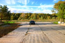 The Sport Black Car Near The Forest Under The Sky Stock Photography The Sport Black Car Near The Forest Under The Sky Stock Photography