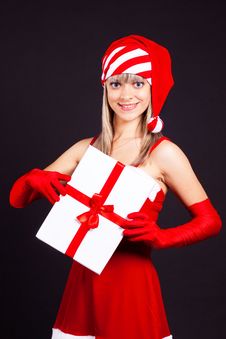 Santa Girl Holding The Box With Gifts. Stock Photography Santa Girl Holding The Box With Gifts. Stock Photography