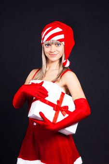 Santa Girl Holding The Box With Gifts. Stock Photography Santa Girl Holding The Box With Gifts. Stock Photography