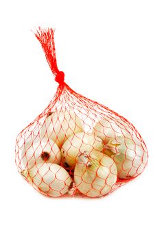 Light Onion In Packing From Red Net Royalty Free Stock Photos