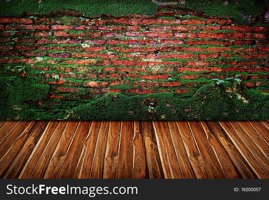 Texture of old stone wall covered green moss