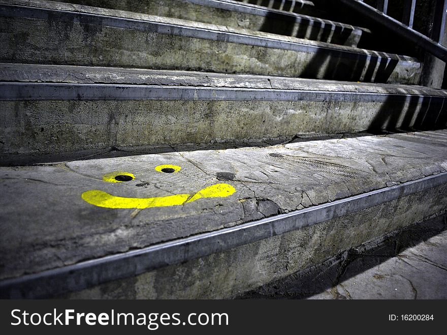 Graffiti Smile on the ladder side walkpath