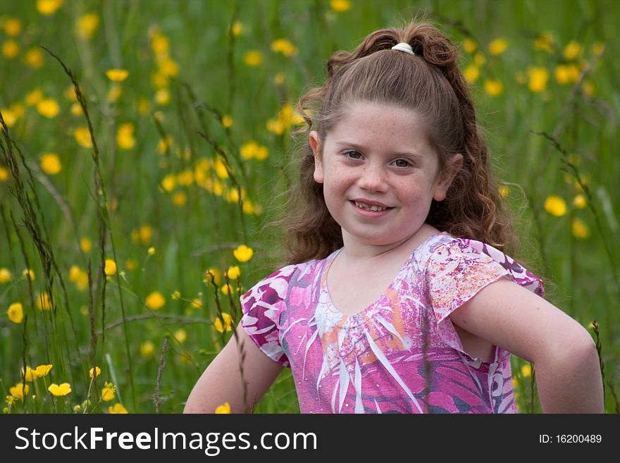 Beautiful young girl in a field of yellow flowers. Beautiful young girl in a field of yellow flowers