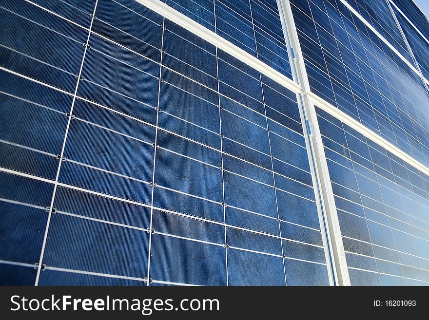 Detail of a blue solar panel. Background