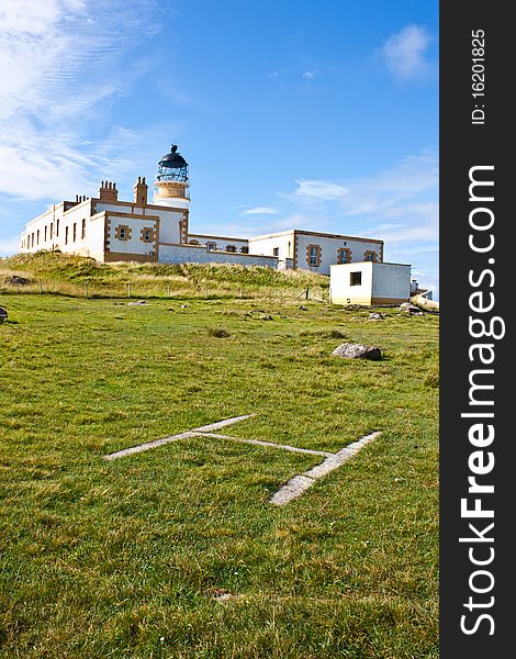 Helicopter platform close to lighthouse in Scotland. Helicopter platform close to lighthouse in Scotland