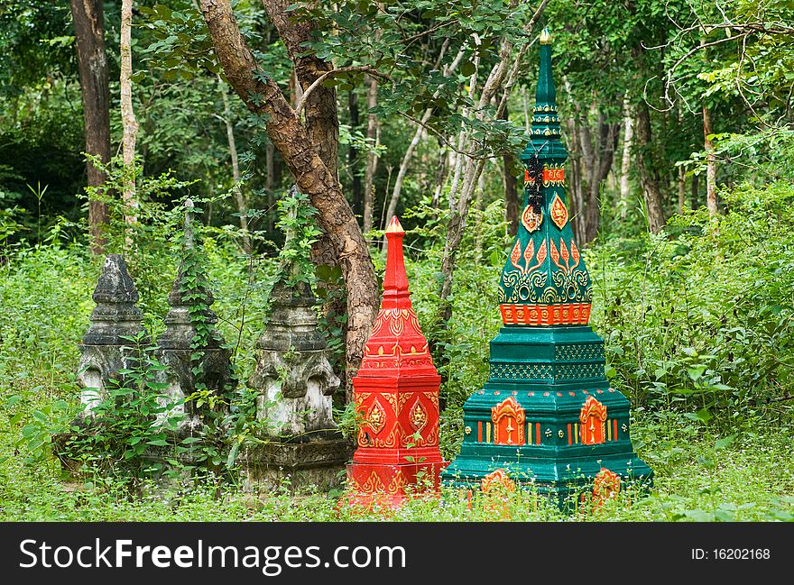 Tombstones in the forest at a rural Buddhist temple in Nakon Ratchasima, Thailand. Tombstones in the forest at a rural Buddhist temple in Nakon Ratchasima, Thailand.