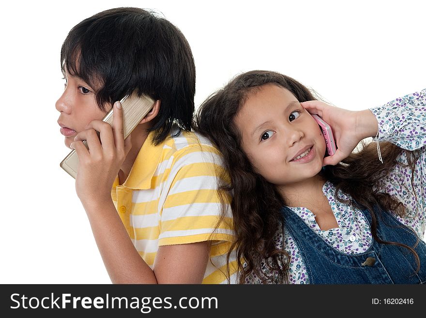 Cellphone, portrait of two children talkind with mobilephone against white background