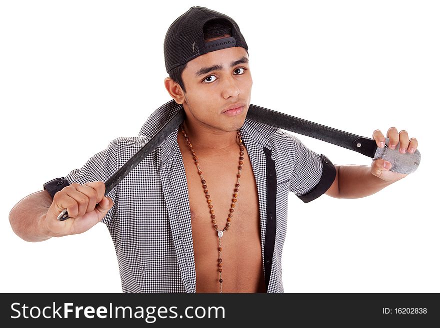 Young and handsome latin man, with a belt - as a bad boy isolated on white, studio shot