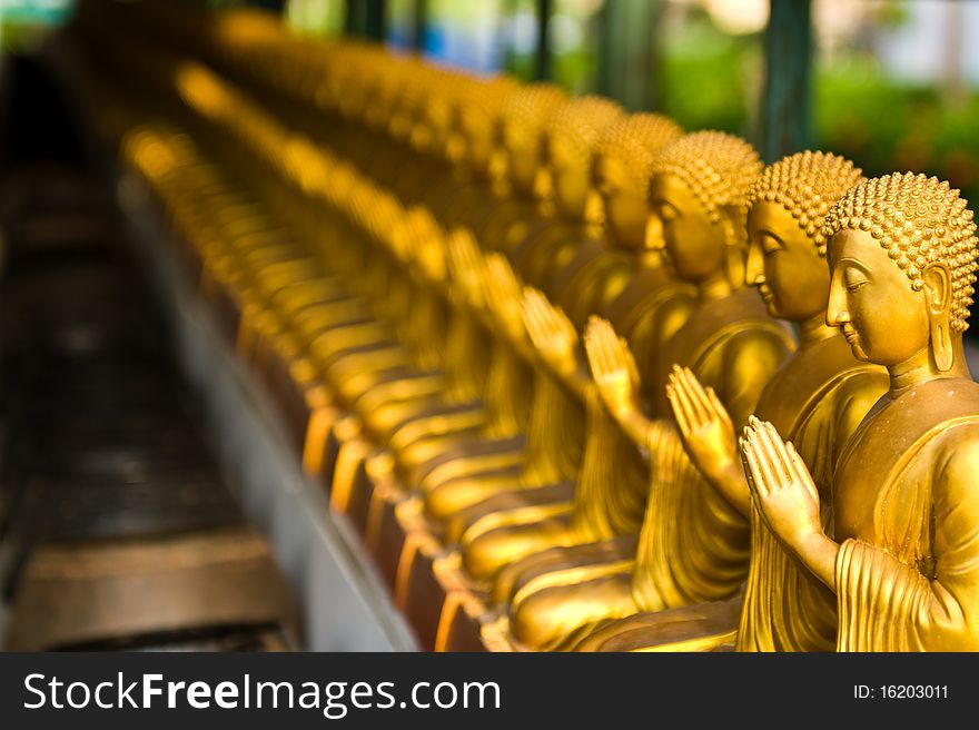 View of buddha statue in gold paint