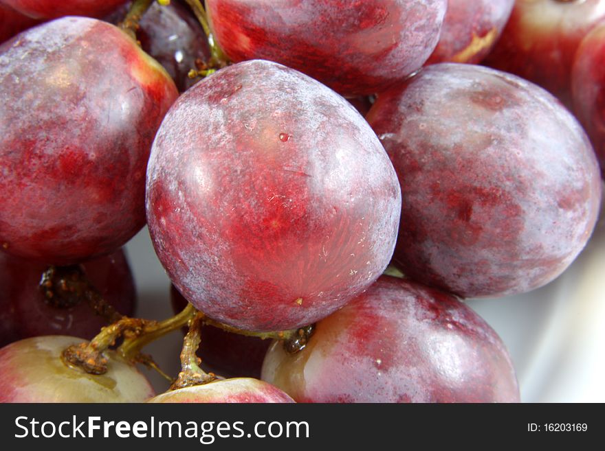 Grapes on a white background