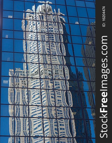 Reflection of a skyscraper in another. Reflection of a skyscraper in another