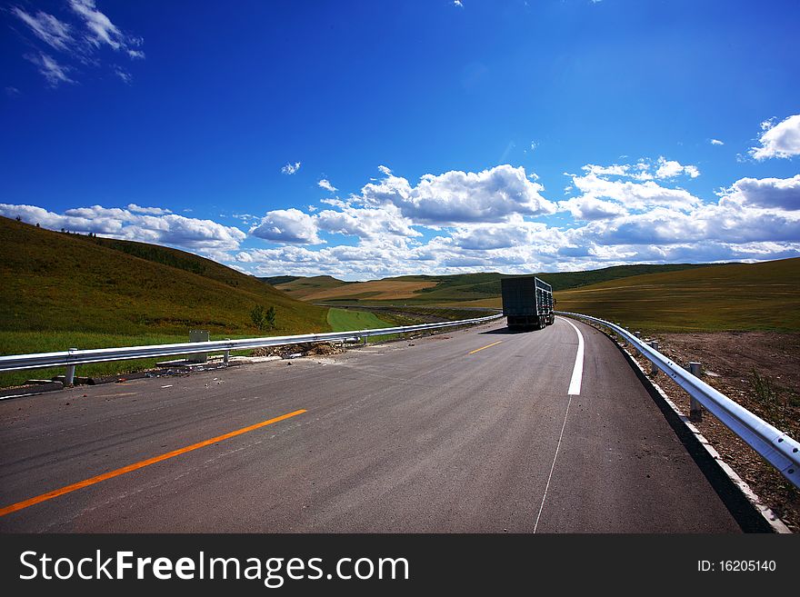 A beautiful road in the meadow