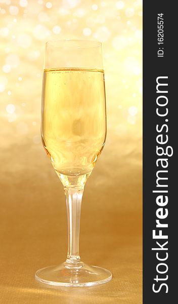 Studio photo of champagne glasse on gold background. Studio photo of champagne glasse on gold background