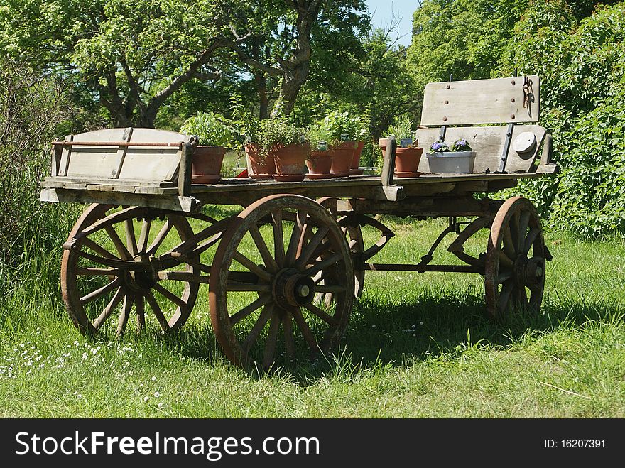 Wagon with flowers and pots, at summertime somewhere in sweden