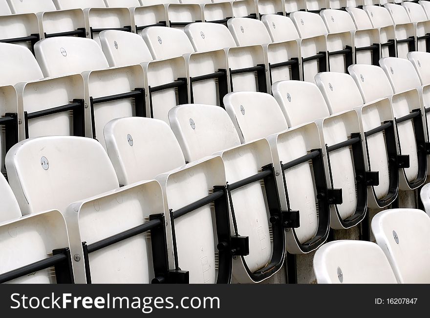 Rows of seats with no smoking signs on their backs