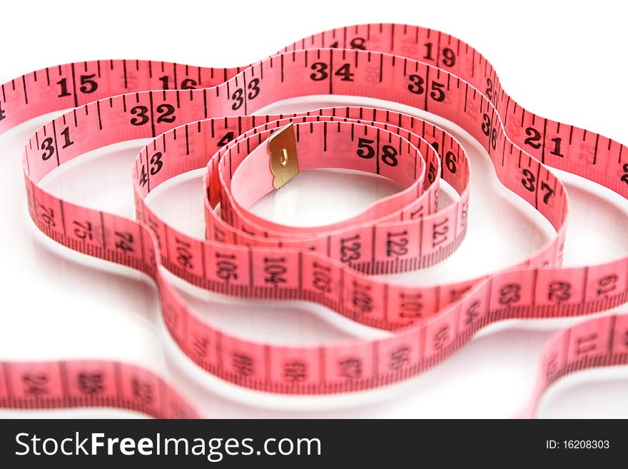 Pink measuring tape isolated on white. Pink measuring tape isolated on white