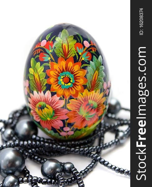 Painted Easter eggs witn string of beads