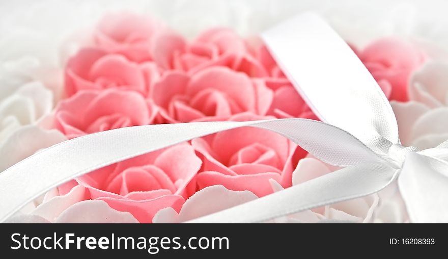 Rose flowers pink and white made of soap isolated on white. Rose flowers pink and white made of soap isolated on white