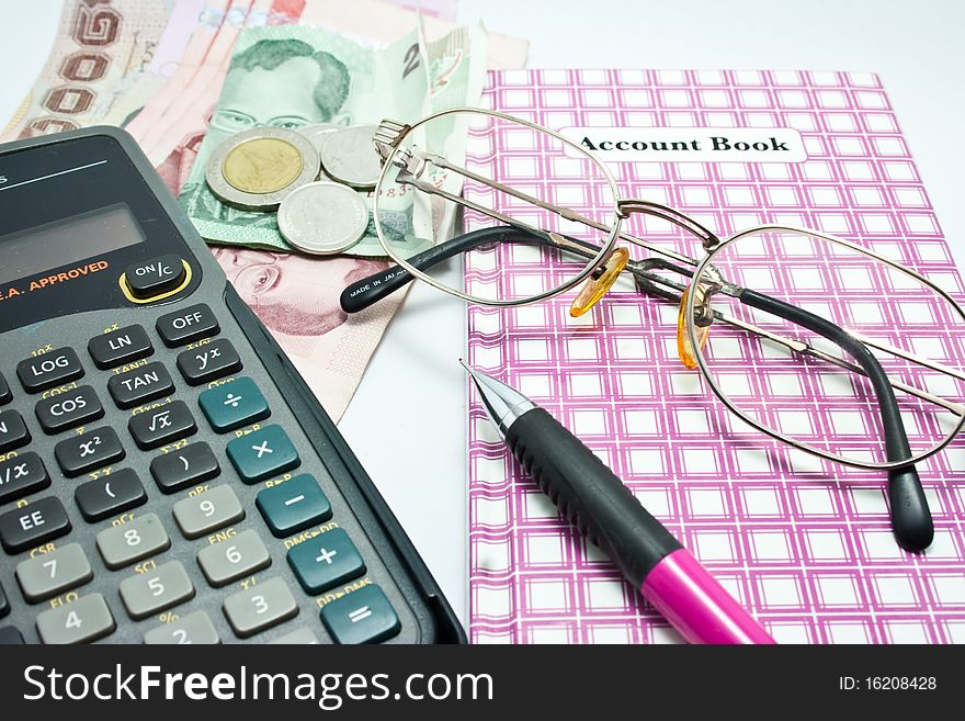 Account book with calculator, pen