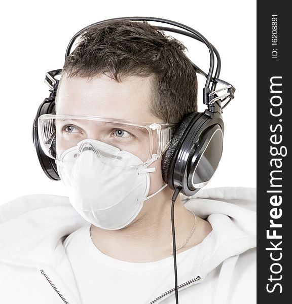 Portrait Of Man In Mask With Headphones