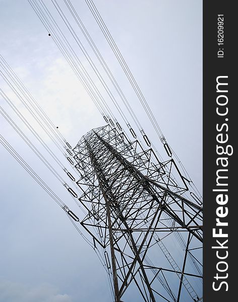 Electric high voltage post with the sky background