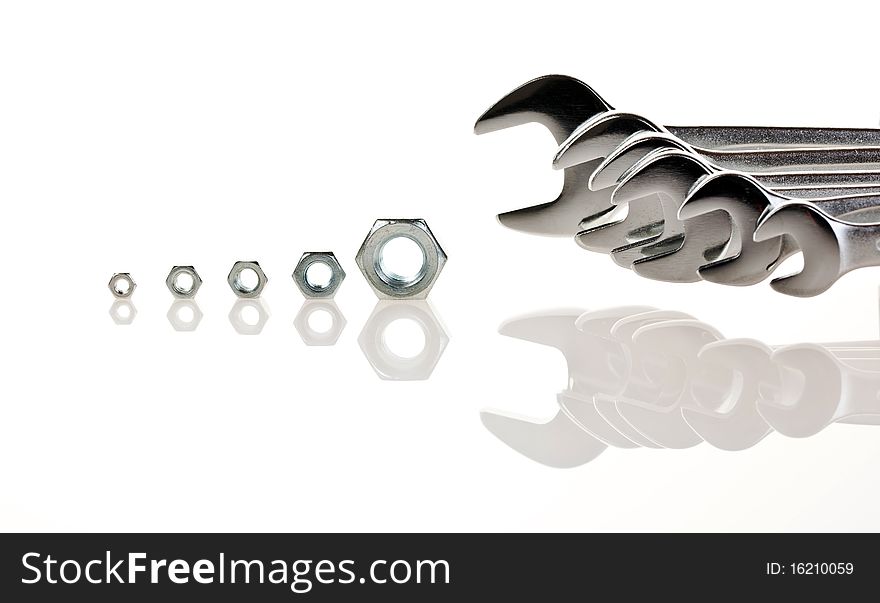 Spanners with nuts isolated on a white background