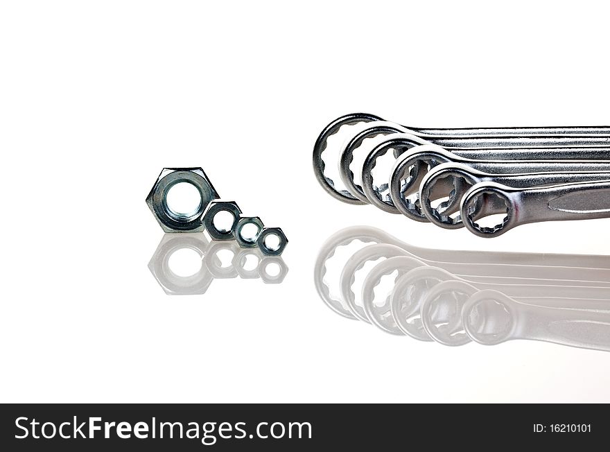 Spanners with nuts isolated on a white background