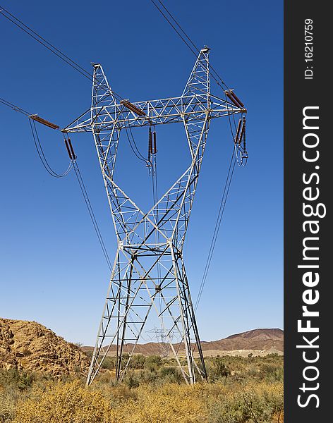 Power lines running through the arizona desert