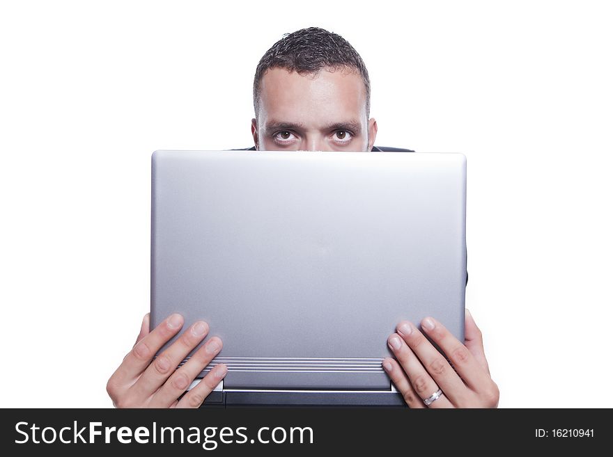 Businessman behind his laptop, isolated on white