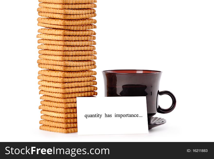 A cup of coffee with a mountain of cookies and a note quantity  has  importance on a white background. A cup of coffee with a mountain of cookies and a note quantity  has  importance on a white background