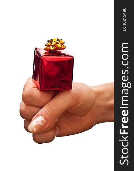 Red gift box on woman s hand