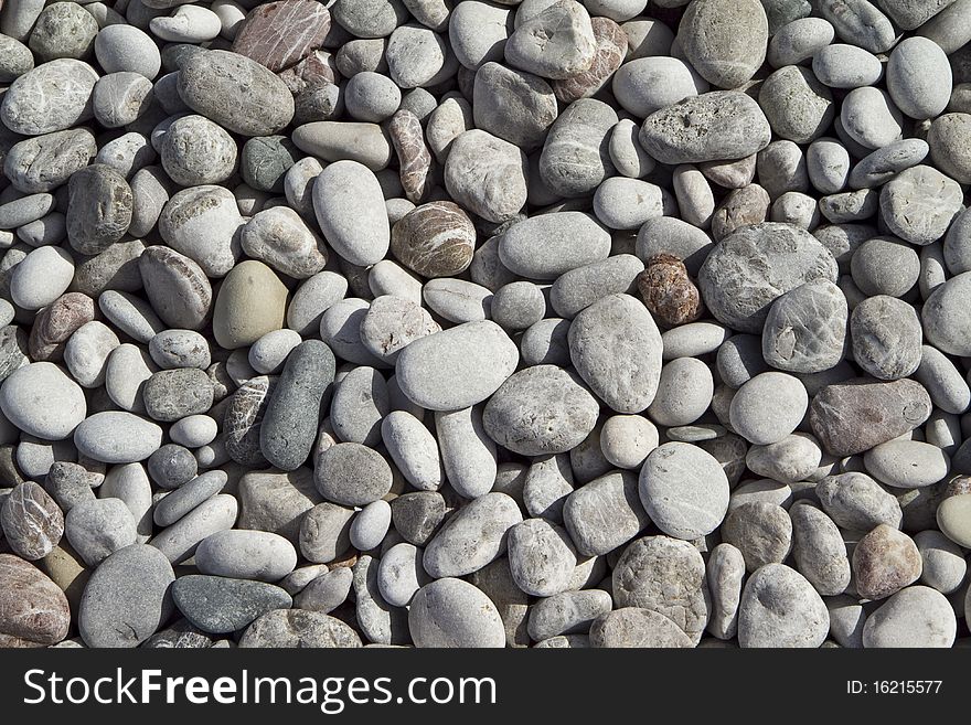 Smooth beach stones in Rhodes Greece