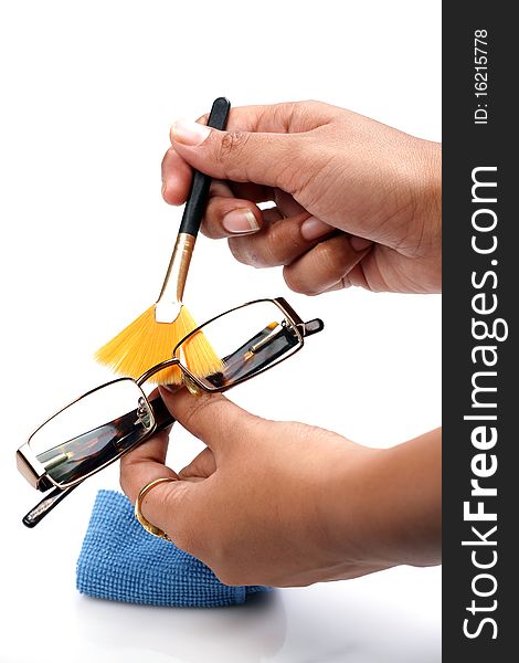 Cleaning specs with soft brush. Cleaning specs with soft brush.