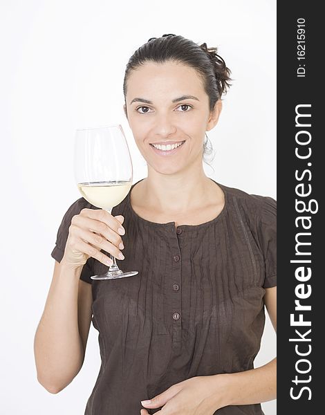 Pretty young woman with white wine