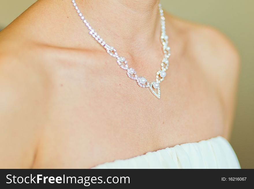 Beautiful adornment on neck of young bride